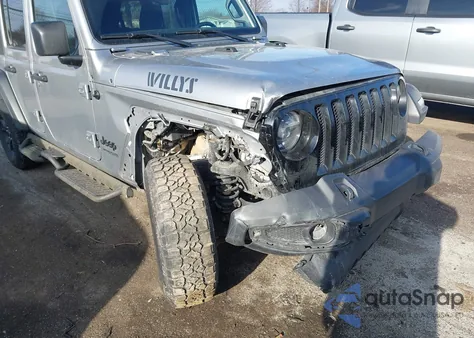 2021 Jeep Wrangler Unlimited Willys 4X4 z USA, uszkodzony, nr VIN 1C4HJXDG3MW693522